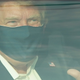 Trump cruising outside Walter Reed to wave to his supporters on Sunday.